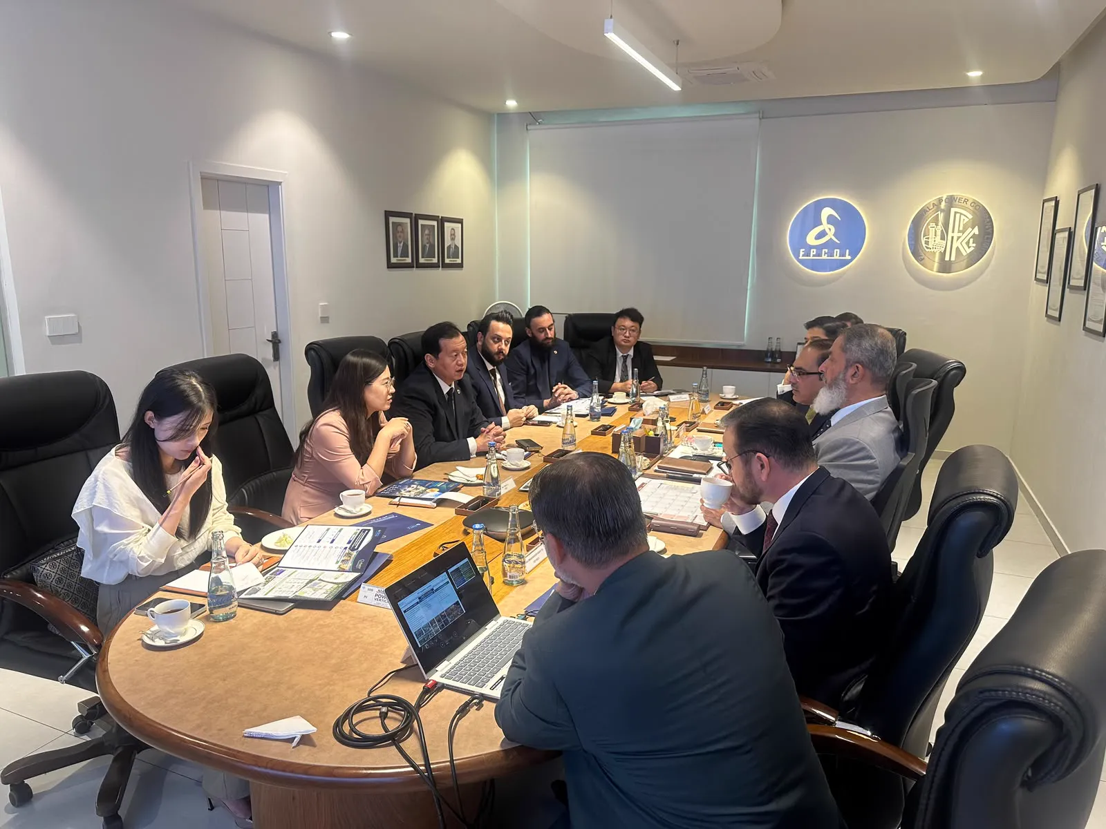 Partnership meeting around a boardroom table